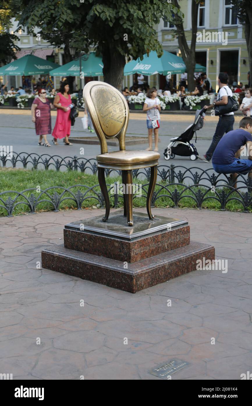 Statue of a chair in Odessa, Ukraine, a well-known tourist attraction and photo opportunity. Stock Photo