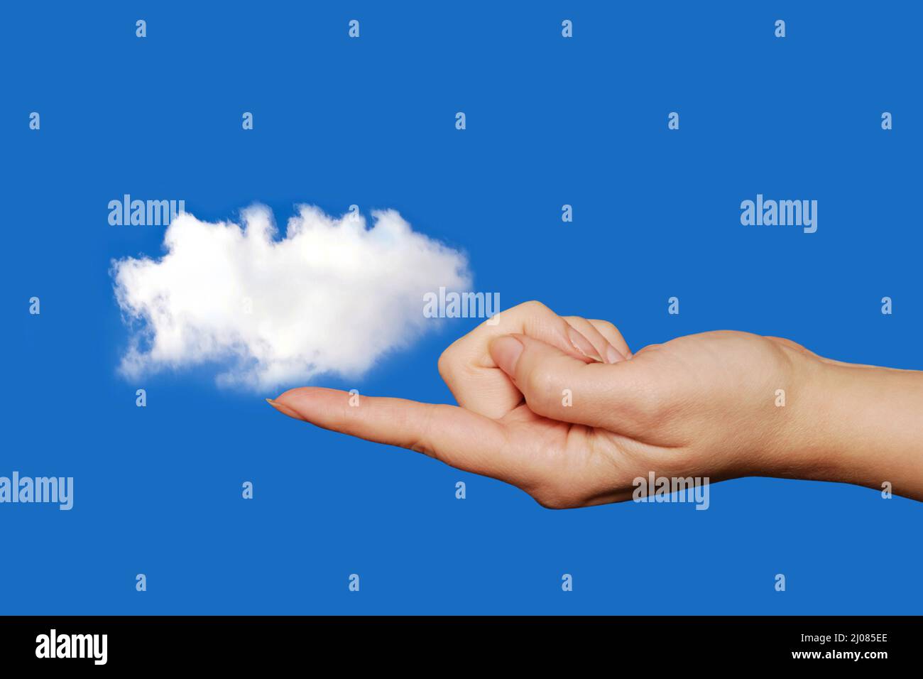 finger  holding or touching a cloud, data storage cloud computing concept Stock Photo