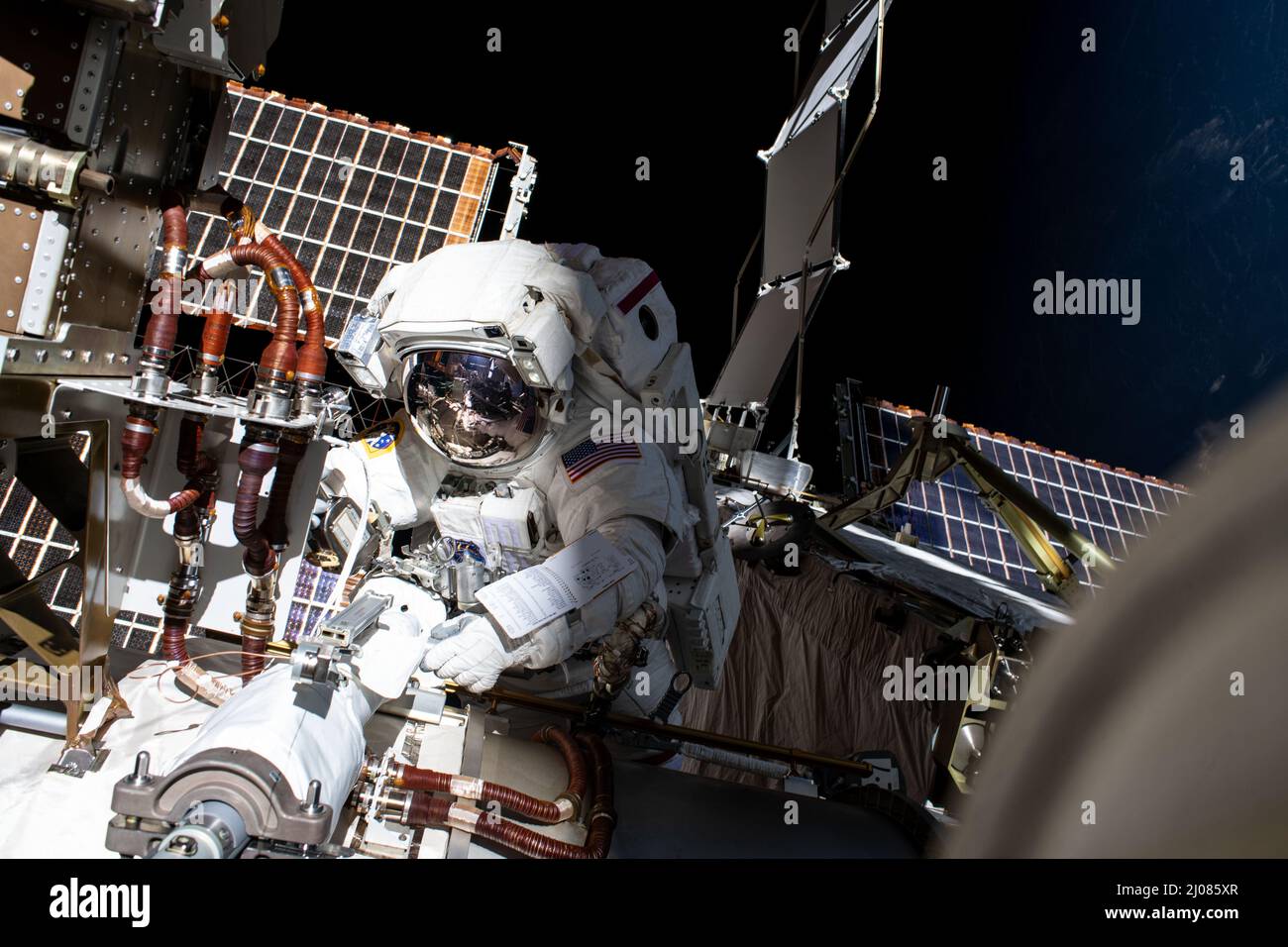 International Space Station, Earth Orbit. 15th Mar, 2022. International Space Station, EARTH ORBIT. 15 March, 2022. NASA astronaut Kayla Barron, installs a modification kit on the International Space Station's Port-4 truss segment during a nearly 7 hour long spacewalk to prepare the International Space Station for the next roll-out solar array, March 15, 2022 in Earth Orbit. Credit: NASA/NASA/Alamy Live News Stock Photo