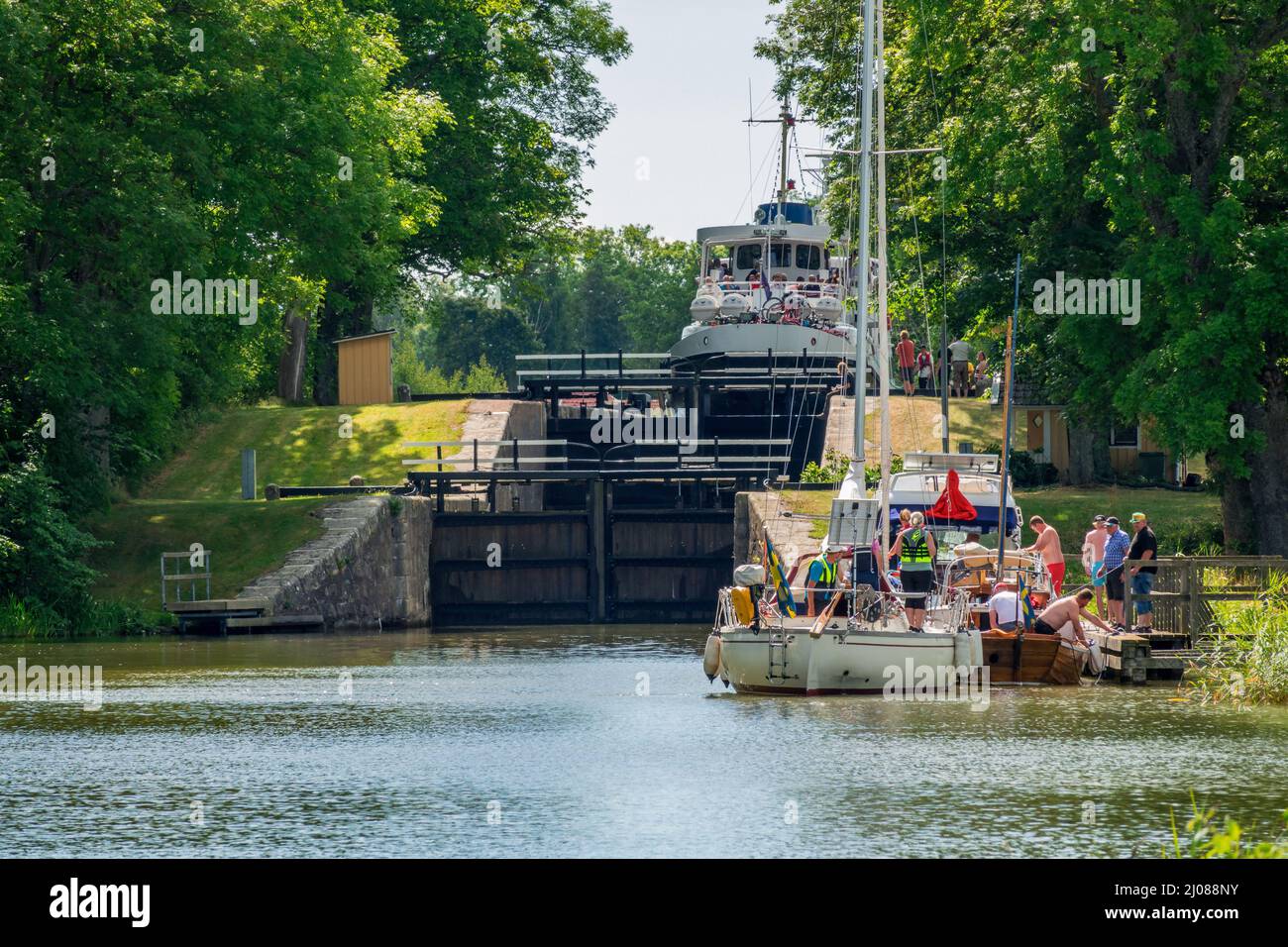 Boats at a canal lock Stock Photo