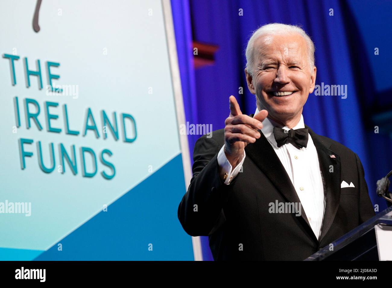 United States President Joe Biden delivers remarks at The Ireland Funds 30th National Gala in the  National Building Museum in Washington on March 16, 2022. Credit: Yuri Gripas / Pool via CNP /MediaPunch Stock Photo