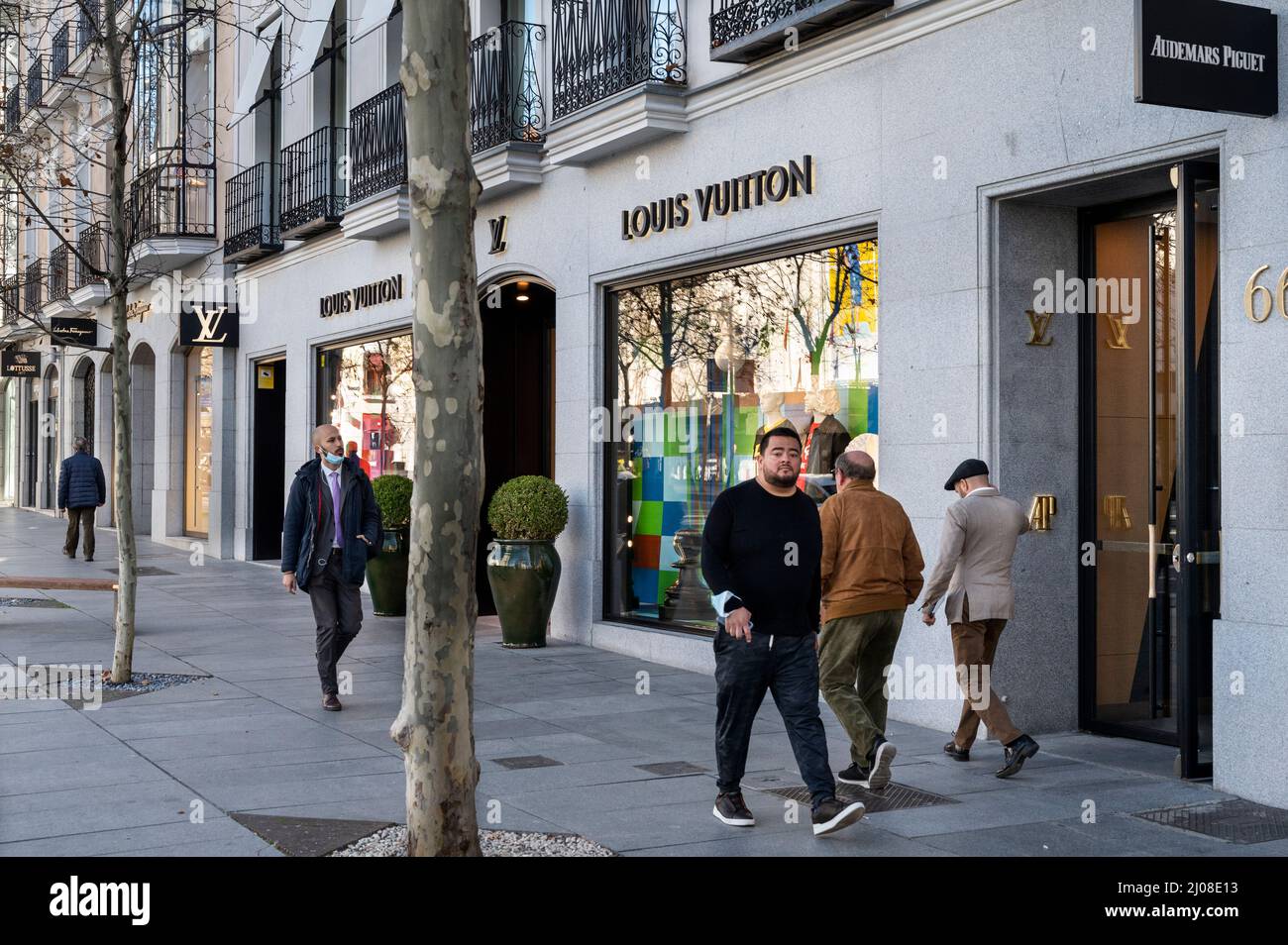 Madrid, Spain. 22nd Feb, 2022. Pedestrians walk past the French luxury  fashion brand Louis Vuitton store in Spain. (Photo by Xavi Lopez/SOPA  Images/Sipa USA) Credit: Sipa USA/Alamy Live News Stock Photo 