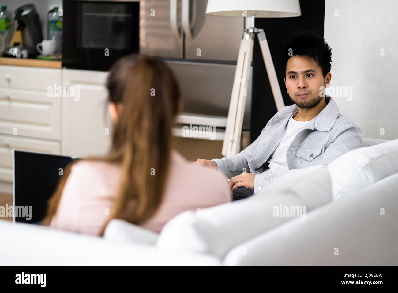 Young Diverse People Working In Coliving Space Stock Photo