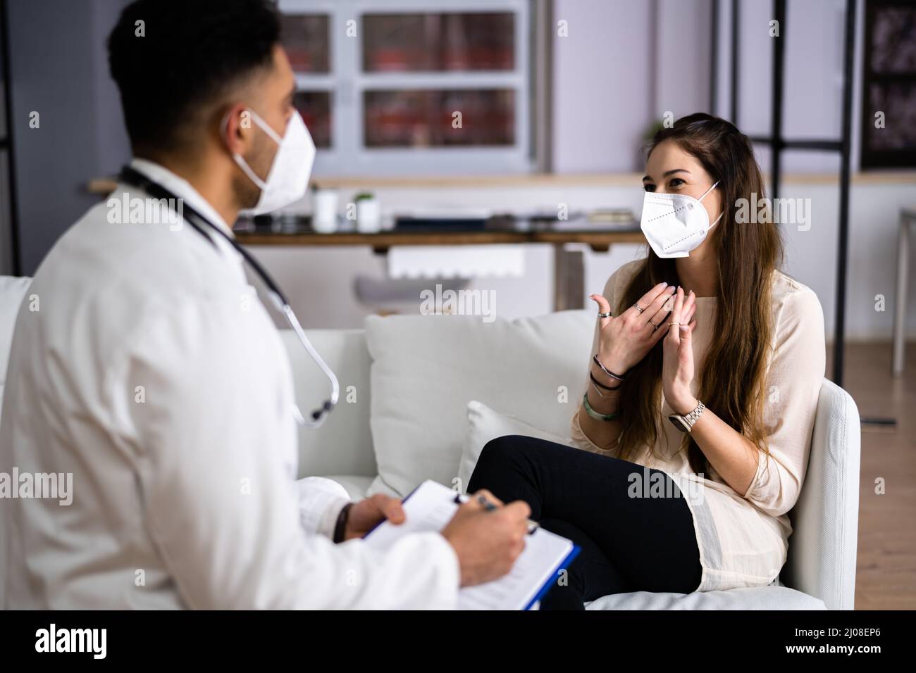 Muslim woman with face mask hi-res stock photography and images - Alamy