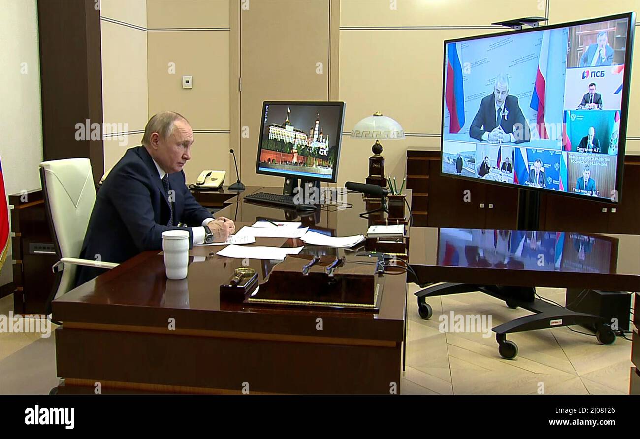 Novo-Ogaryovo, Russia. 17th Mar, 2022. Russian President Vladimir Putin chairs a meeting to discuss the socioeconomic development of Crimea and Sevastopol via video conference from the official residence of Novo-Ogaryovo, March 17, 2022 outside Moscow, Russia. Credit: Mikhael Klimentyev/Kremlin Pool/Alamy Live News Stock Photo