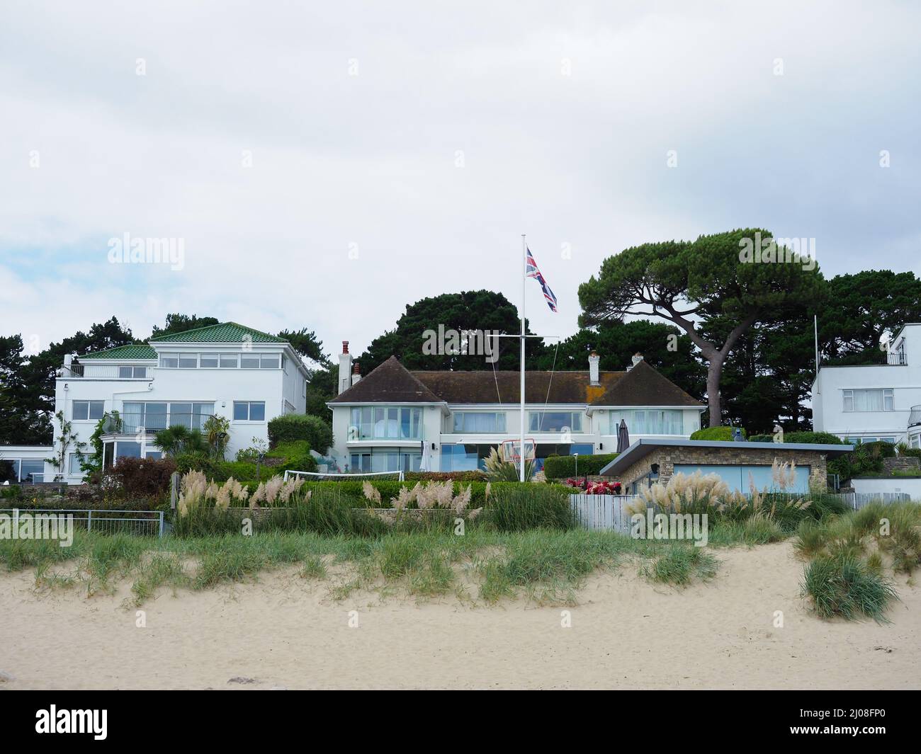 Some beachside houses designed in the 1920s and 30s at Sandbanks in Poole in the UK Stock Photo