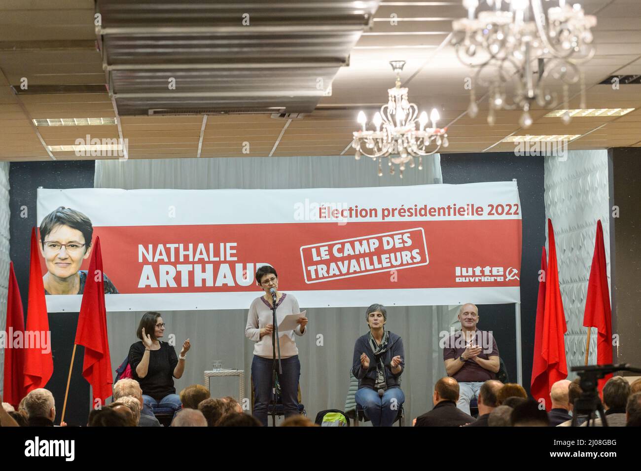 Marseille, France. 16th Mar, 2022. Nathalie Arthaud is seen on stage making her speech. Nathalie Arthaud, candidate to the French presidential election attends a meeting in Marseille. She gathered about 50 people. She represents the Trotskyist party Lutte Ouvriere. The polls credit her with less than 1% of the vote in the first round. Credit: SOPA Images Limited/Alamy Live News Stock Photo