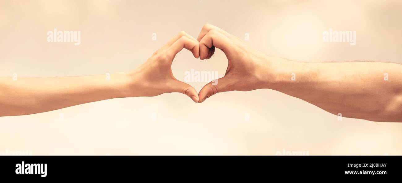 Love, friendship concept. Girl and male hand in heart form love blue ...
