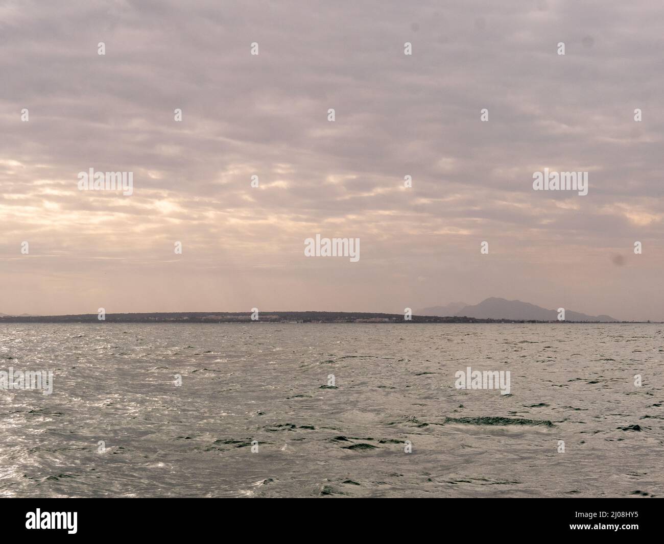 Beautiful twilight sky over a calm sea Stock Photo - Alamy
