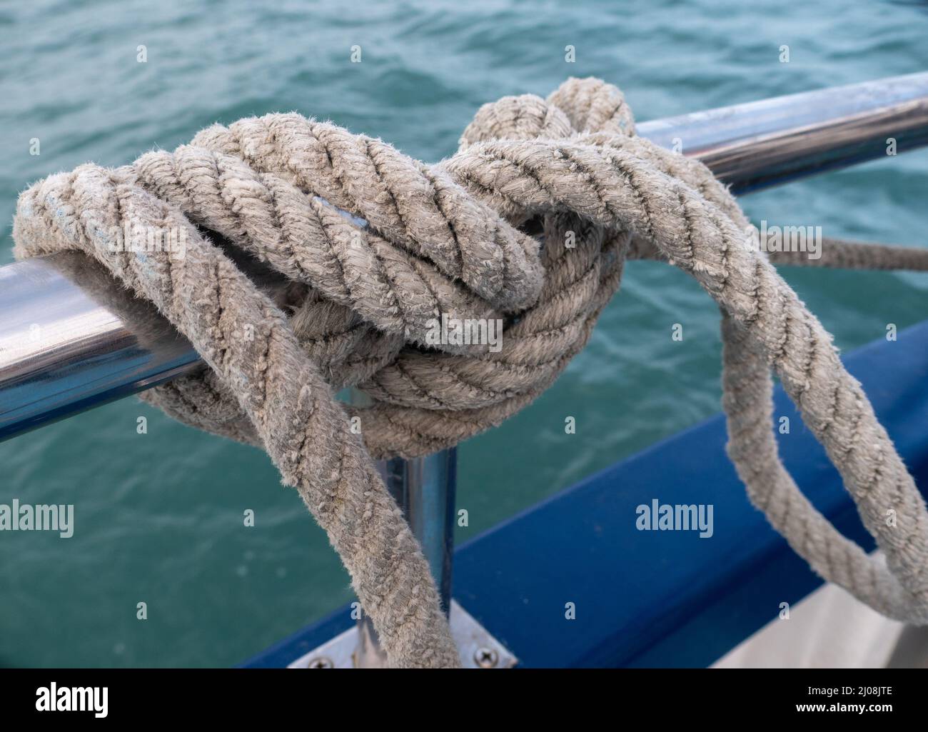 Boat Rope Railing Closeup shot of a thick rope tied on a boat railing Stock Photo - Alamy