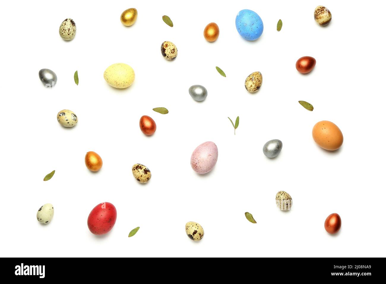 Stylish painted Easter eggs and green leaves on white background Stock ...