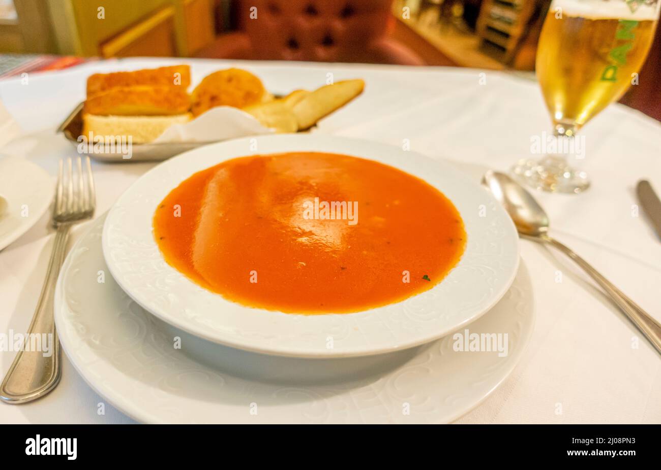 Tomato soup served in Stari Fijaker restaurant of authentic traditional culinary delicacies Zagreb-Zagorje region of Croatia. Stock Photo