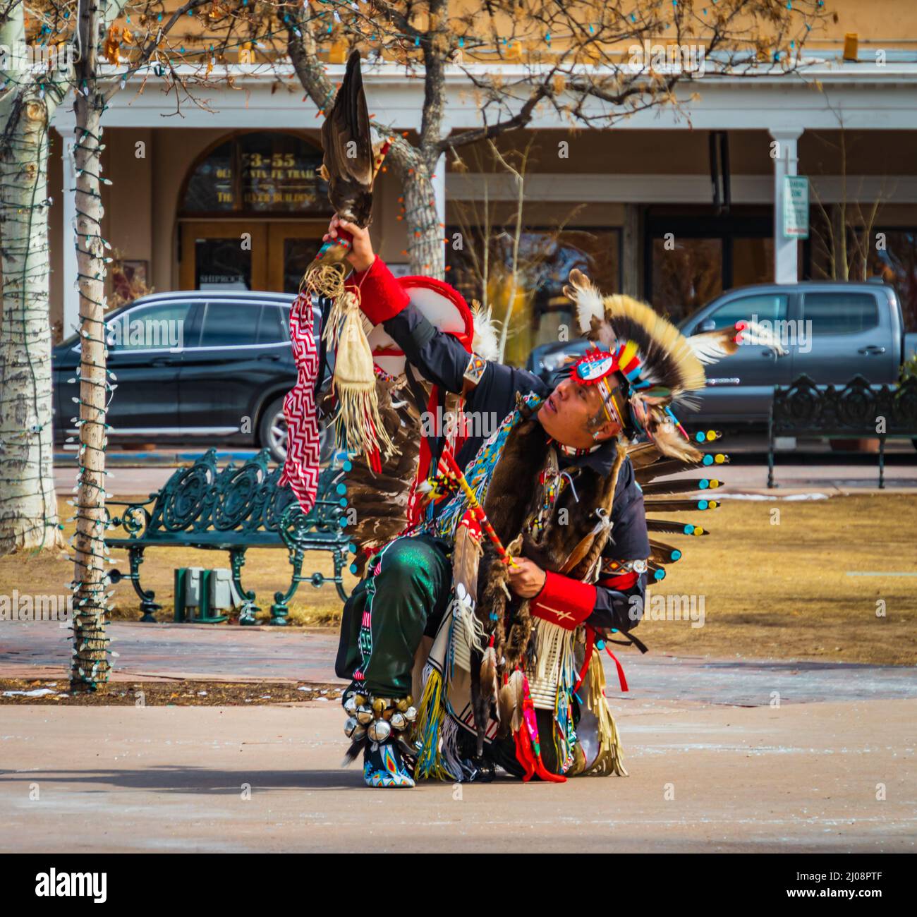 Santa Fe, New Mexico/USA- February 25, 2022: Indigenous native american dancer in traditional costume dancing at the Plaza Stock Photo