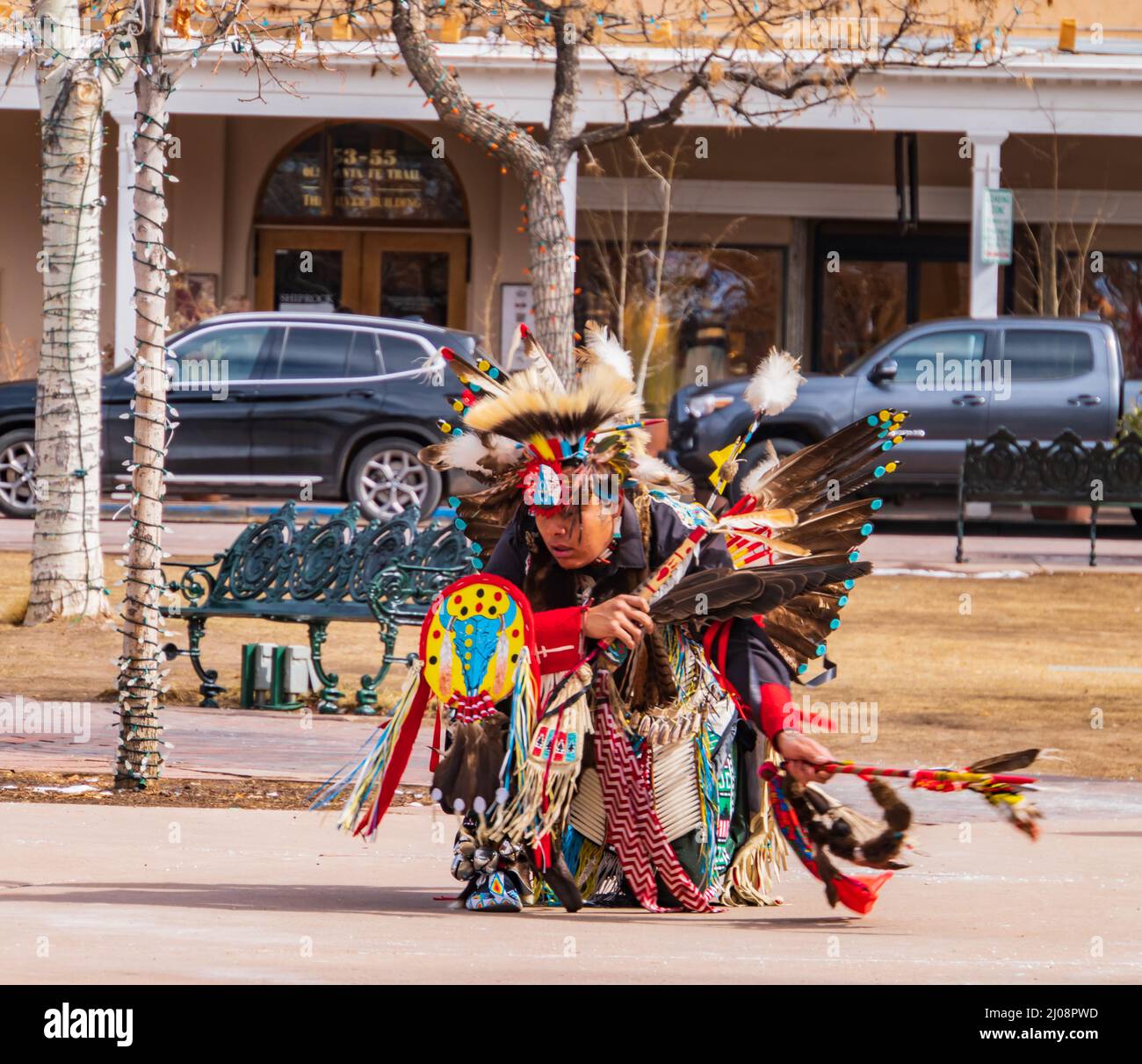 Santa Fe, New Mexico/USA- February 25, 2022: Indigenous native american dancer in traditional costume dancing at the Plaza Stock Photo