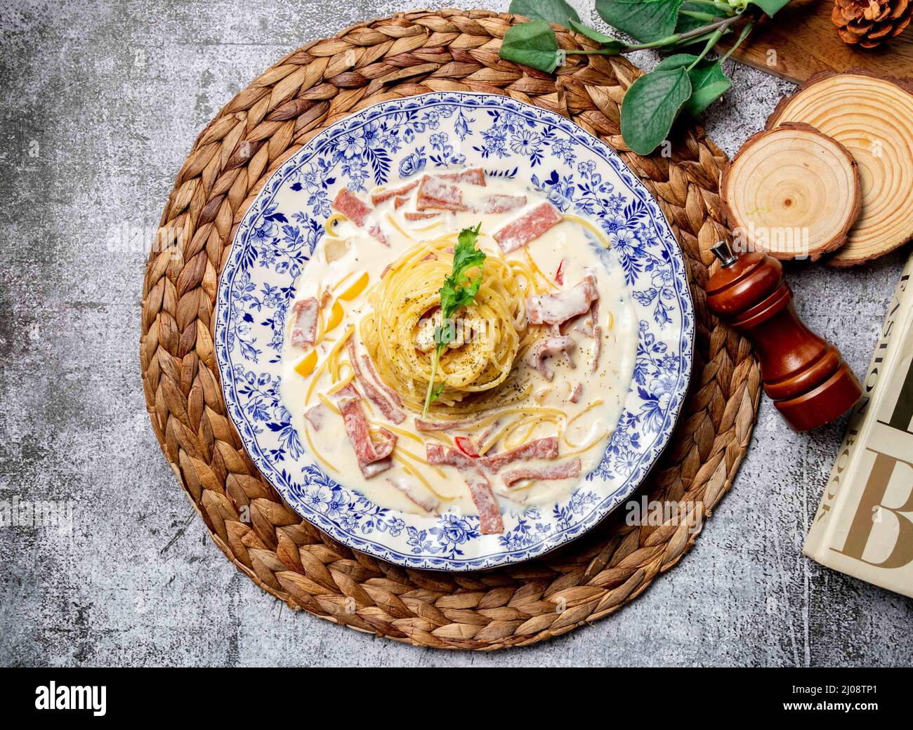 White Sauce Bacon noodles in a dish top view on grey background Taiwan