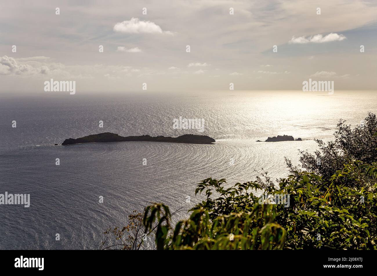 Sunset over uninhabited islands, Terre-de-Haut, Iles des Saintes, Les Saintes, Guadeloupe, Lesser Antilles, Caribbean. Stock Photo