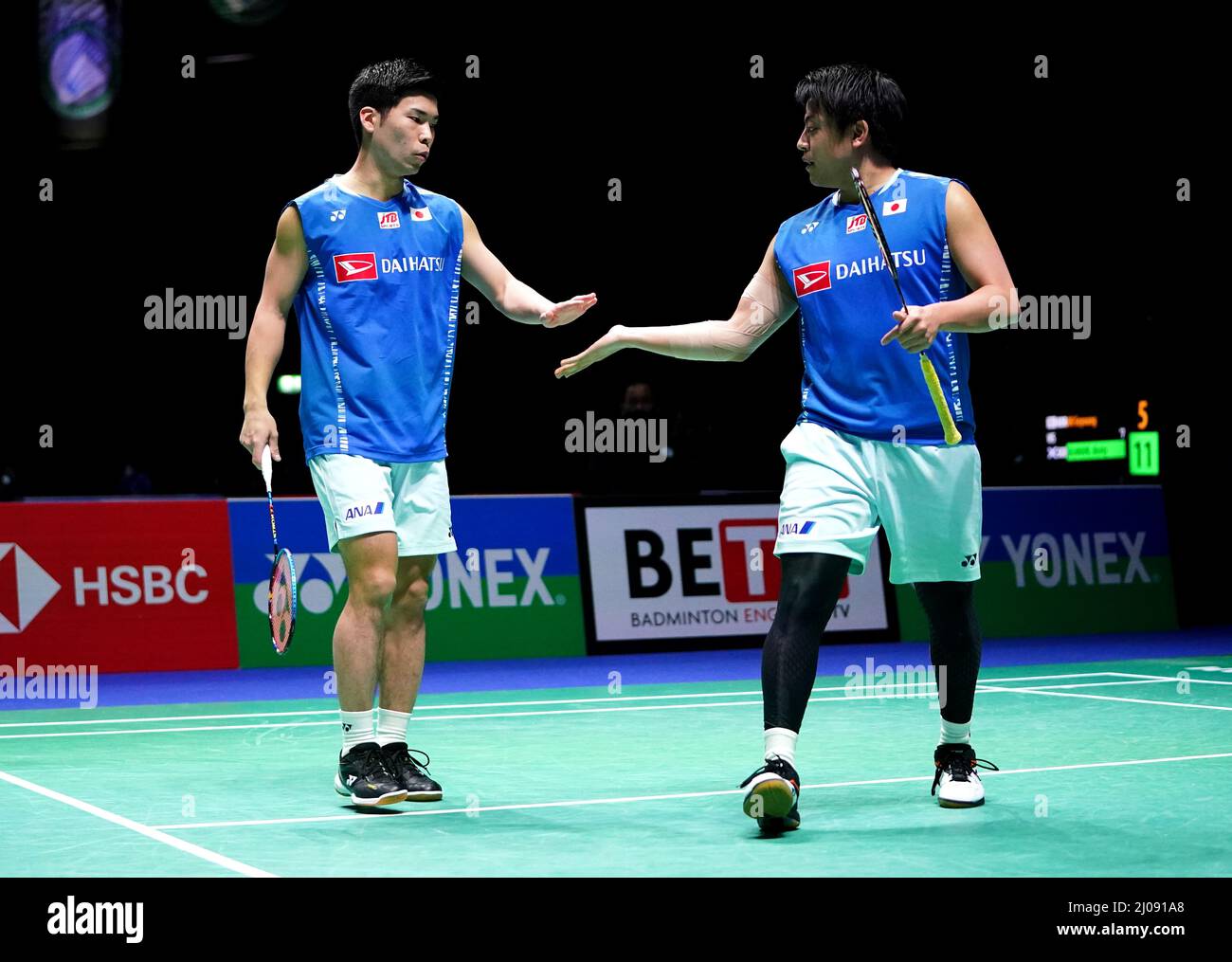 Japan's Akira Koga (right) and Taichi Saito in action against Indonesia's Marcus Fernaldi Gideon and Kevin Saniava Sukamuljo during day two of the YONEX All England Open Badminton Championships at the Utilita Arena Birmingham. Picture date: Thursday March 17, 2022. Stock Photo