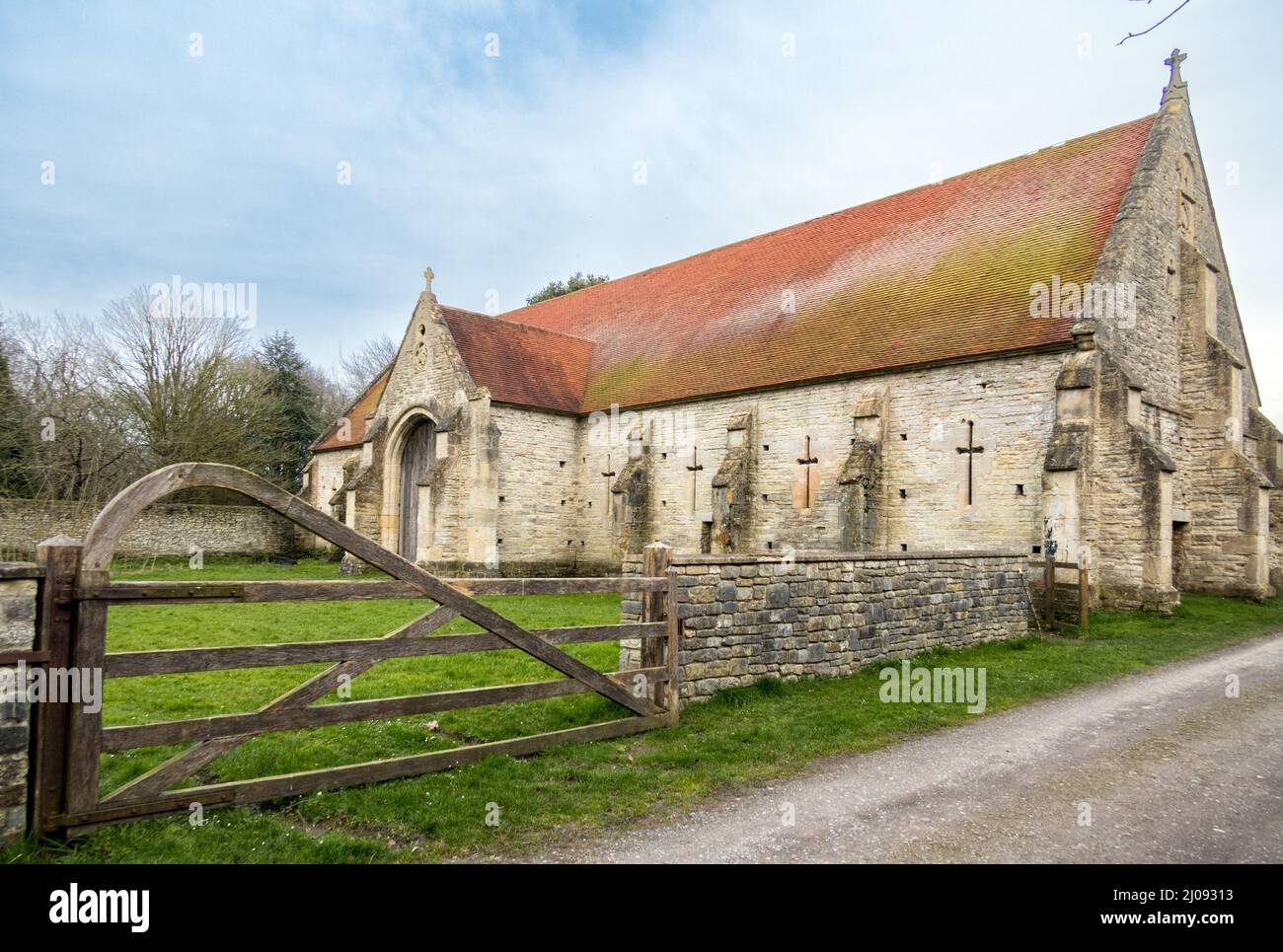 UK, England, Somerset, Pilton village. 12th century Tithe Barn restored by Michael Evis of Worthy Farm & Glastonbury Festival. Stock Photo