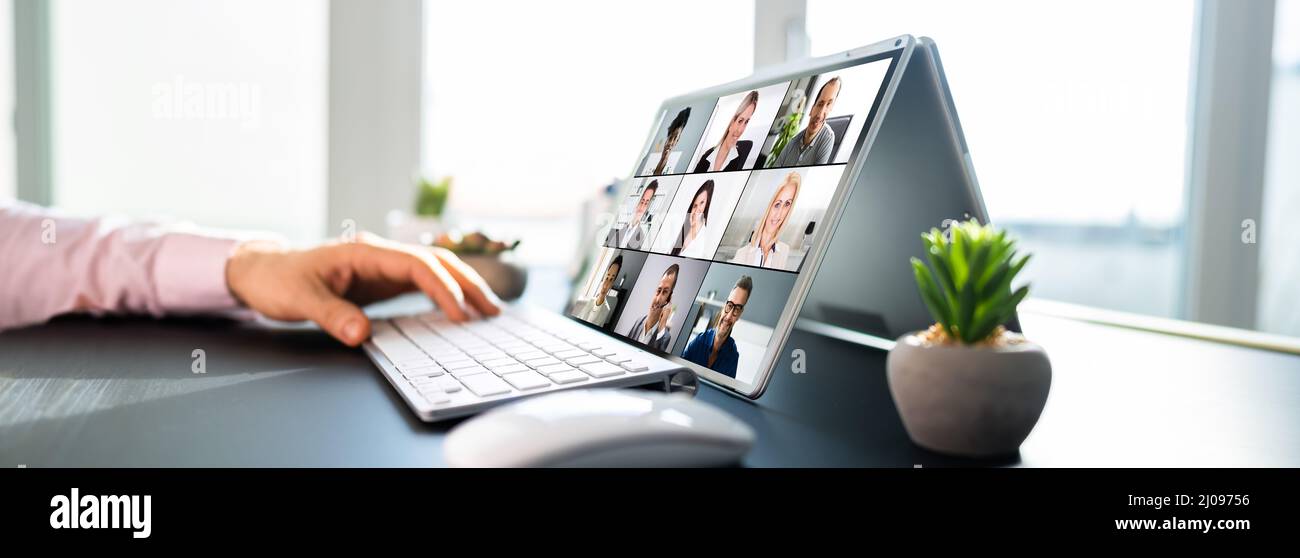 Online Video Conference And Digital Webinar On Screen Stock Photo