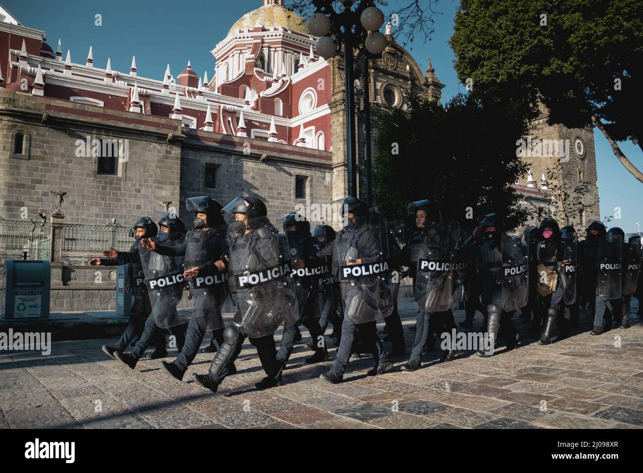 female police officers prepare to repress feminist protesters for ...
