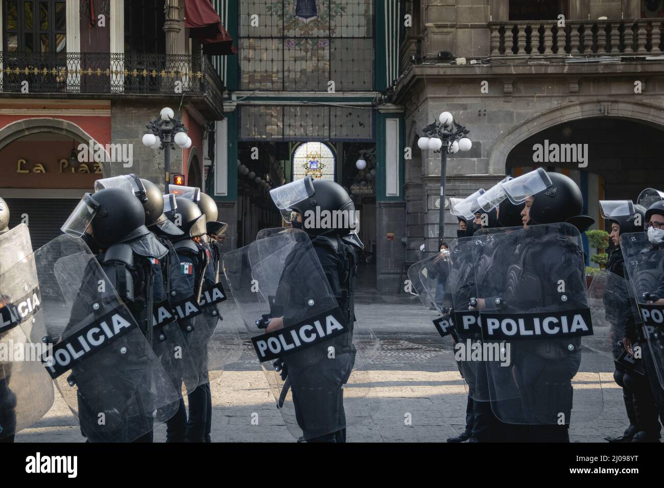 female police officers prepare to repress feminist protesters for ...