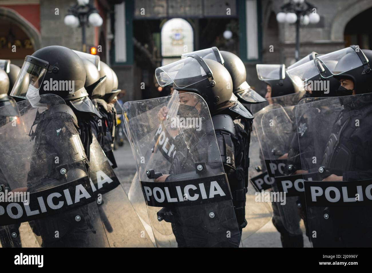 female police officers prepare to repress feminist protesters for ...