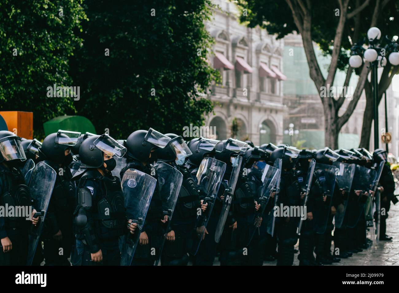 female police officers prepare to repress feminist protesters for ...