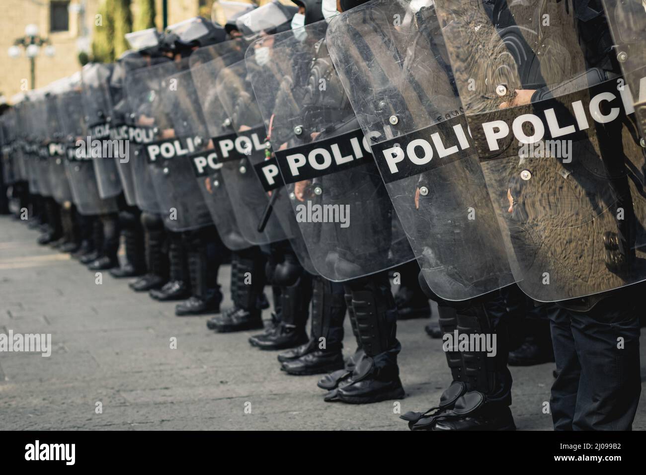 female police officers prepare to repress feminist protesters for ...
