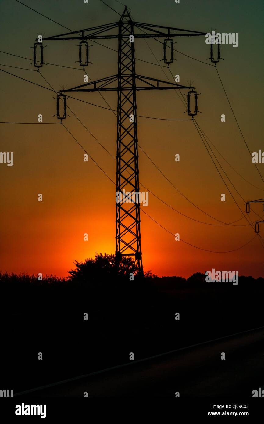 Electric Power Pylon Electric Tower At Sunset Stock Photo Alamy