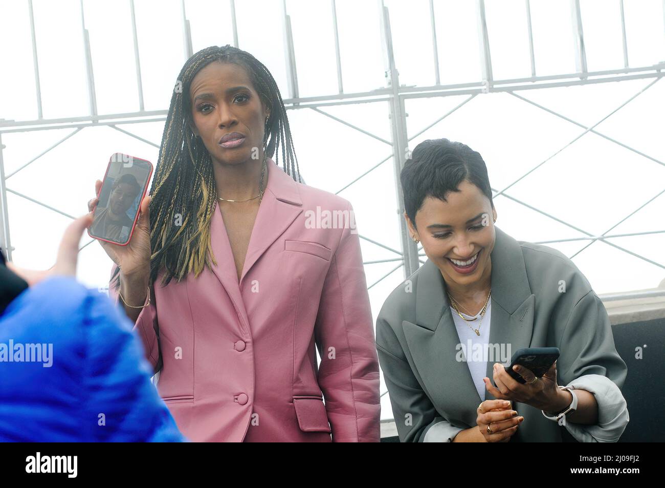 From left) Zainab Johnson and Andy Allo visit the Empire State Building to  promote sci-fi comedy series 'Upload' in New York City. (Photo by Efren  Landaos / SOPA Images/Sipa USA Stock Photo -