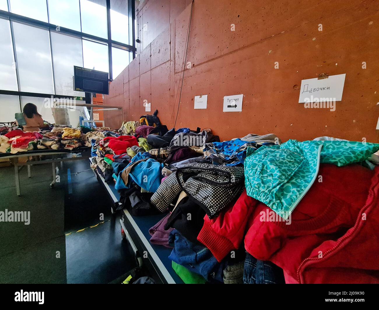 Closeup lot clothes for Ukrainian refugees,women and children,which