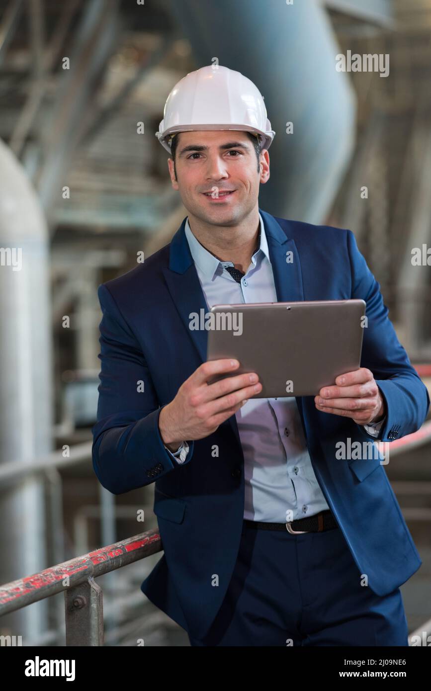 positive nice man looking at camera indoors Stock Photo - Alamy