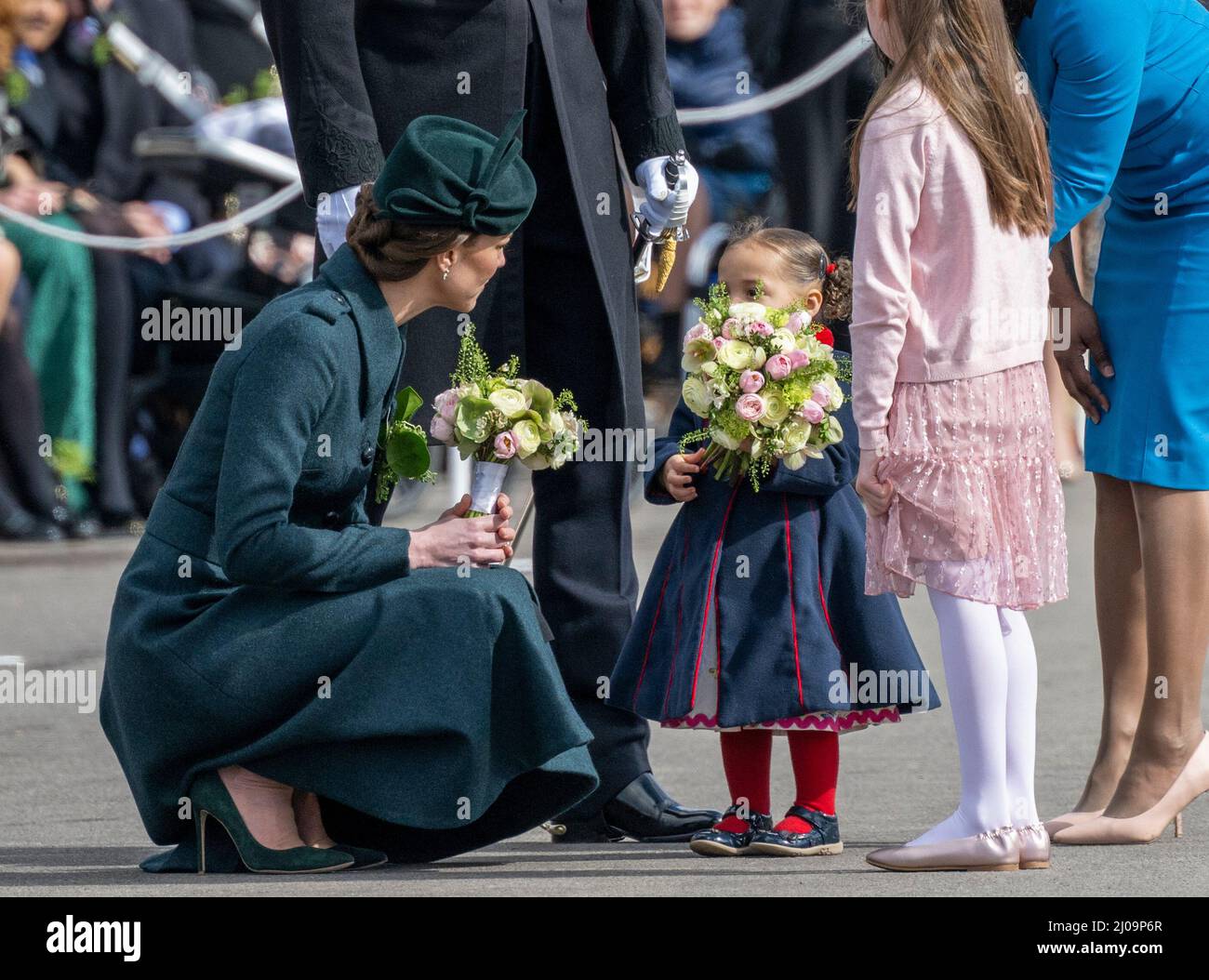 Barracks Christmas Parade 2022 Aldershot, Uk. 17 March, 2022. Catherine, Duchess Of Cambridge Bends To  Receive A Posy Flowers From A Young Girl As She Attends The Irish Guards St  Patrickõs Day Parade At Mons Barracks