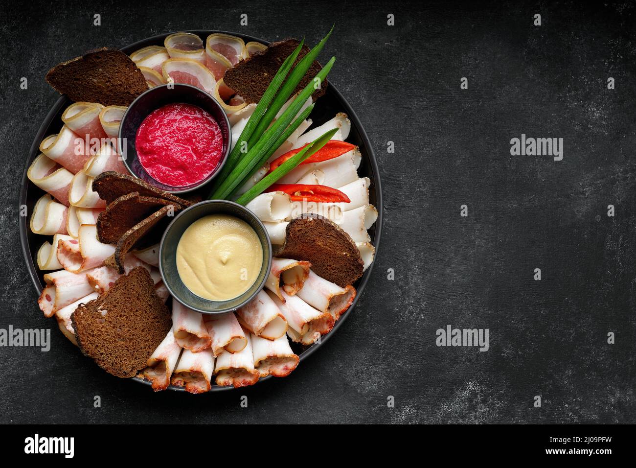 Ukrainian appetizer, salo, horseradish mustard and onion Stock Photo