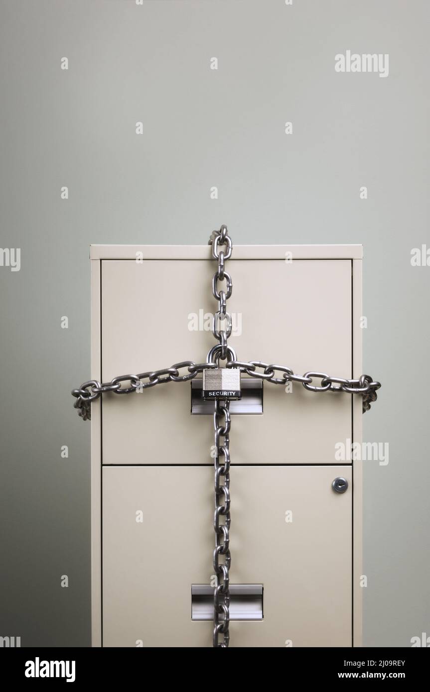 Closeup of a Filing locked with chains Stock Photo Alamy