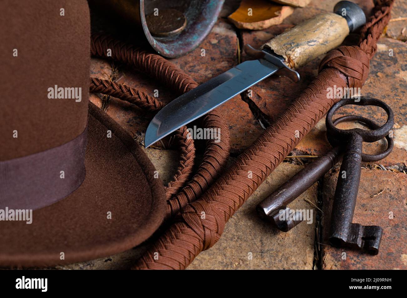 Adventurer themed scene with objects inspired on Indiana Jones Films Stock Photo