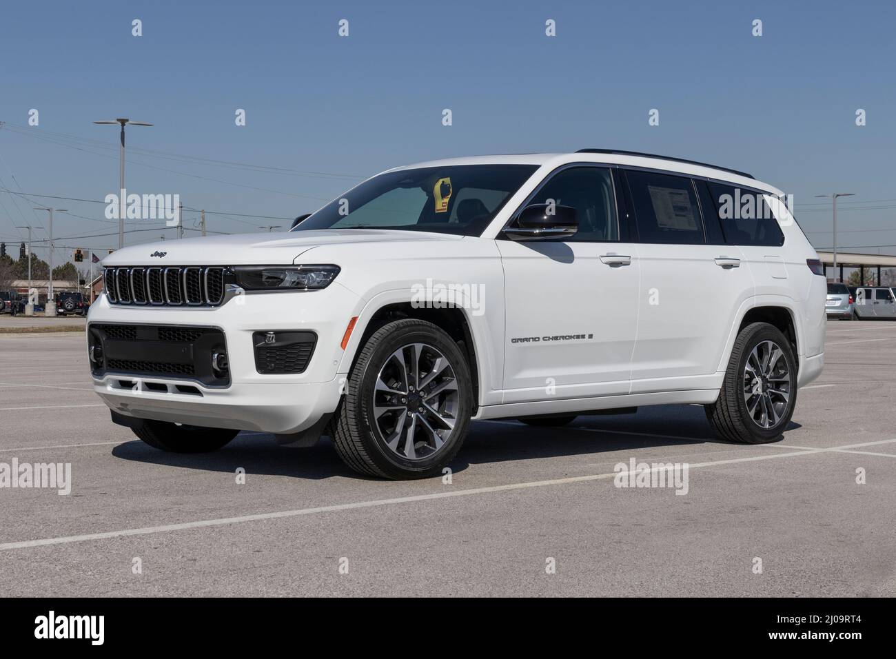 Brownsburg - Circa March 2022: Jeep Grand Cherokee display at a Stellantis dealership. Jeep offers the Grand Cherokee in Laredo, Limited, Trailhawk an Stock Photo