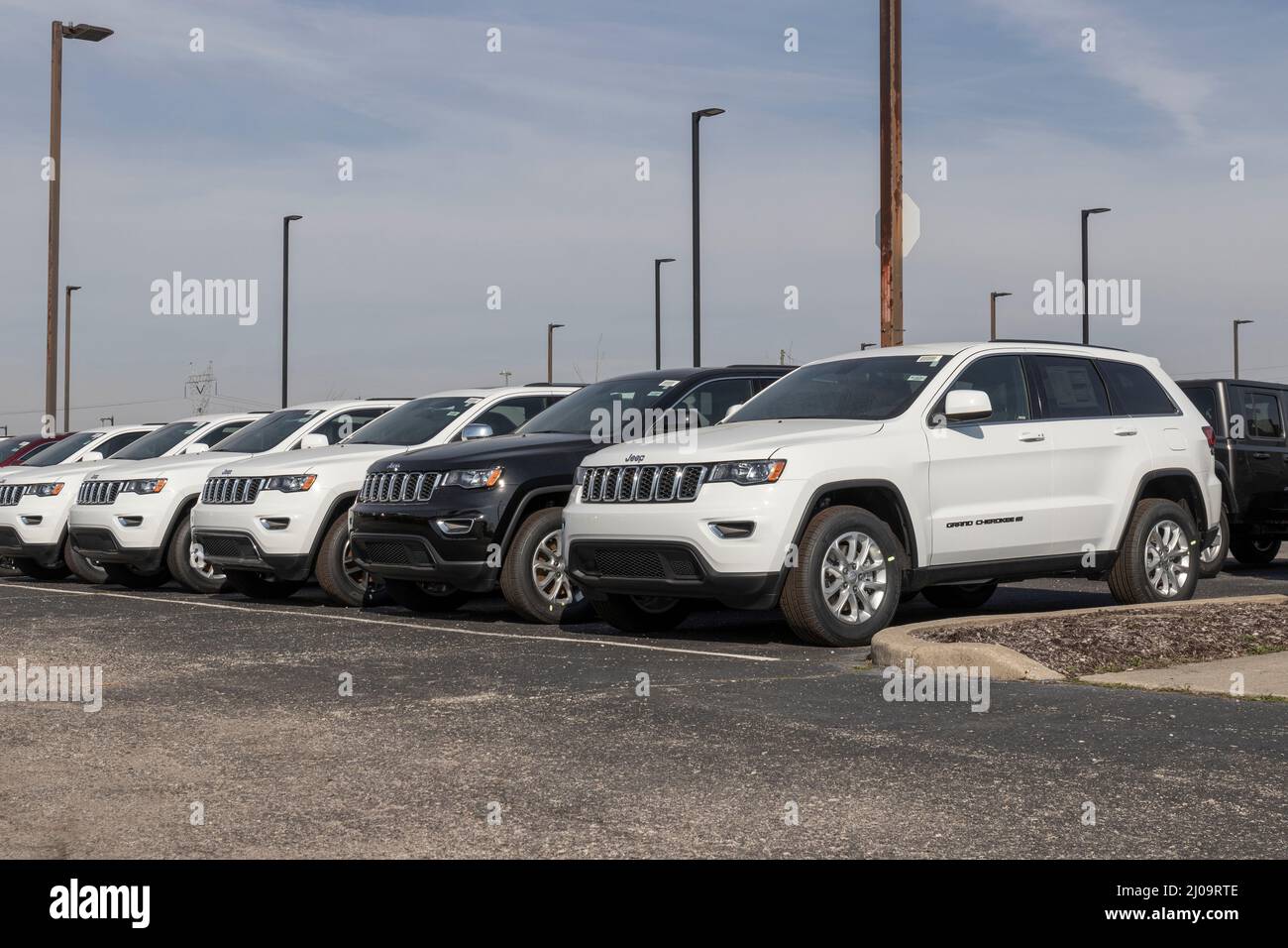 Indianapolis - Circa March 2022: Jeep Grand Cherokee display at a Stellantis dealership. Jeep offers the Grand Cherokee in Laredo, Limited, Trailhawk Stock Photo