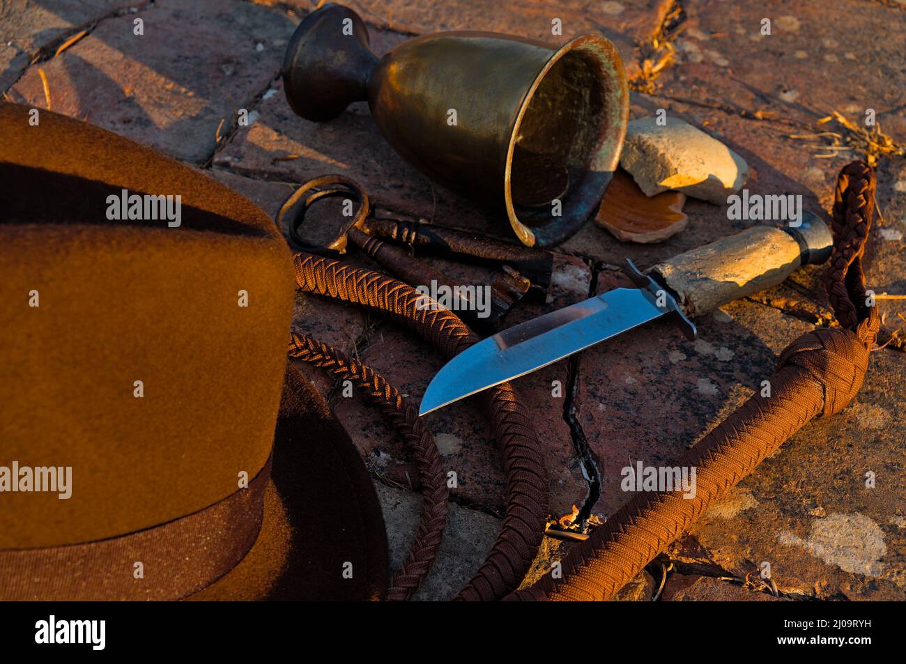 Adventurer themed scene with objects inspired on Indiana Jones Films Stock Photo