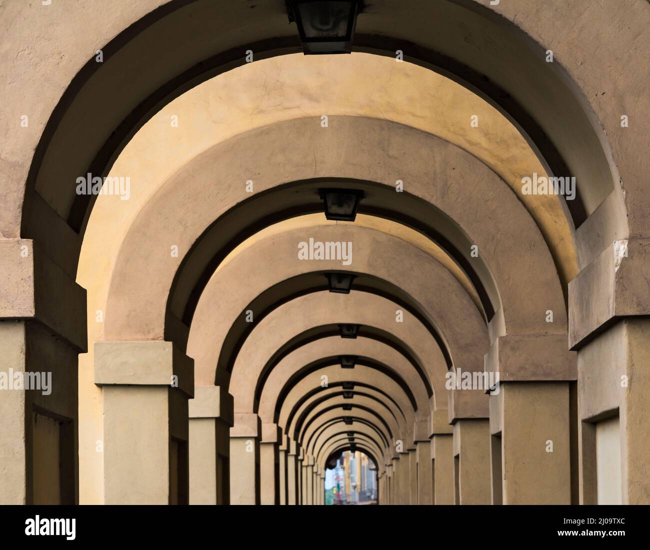 Arch corridor of Ponte Vecchio, a medieval bridge over the Arno River, Florence, Tuscany Region, Italy Stock Photo