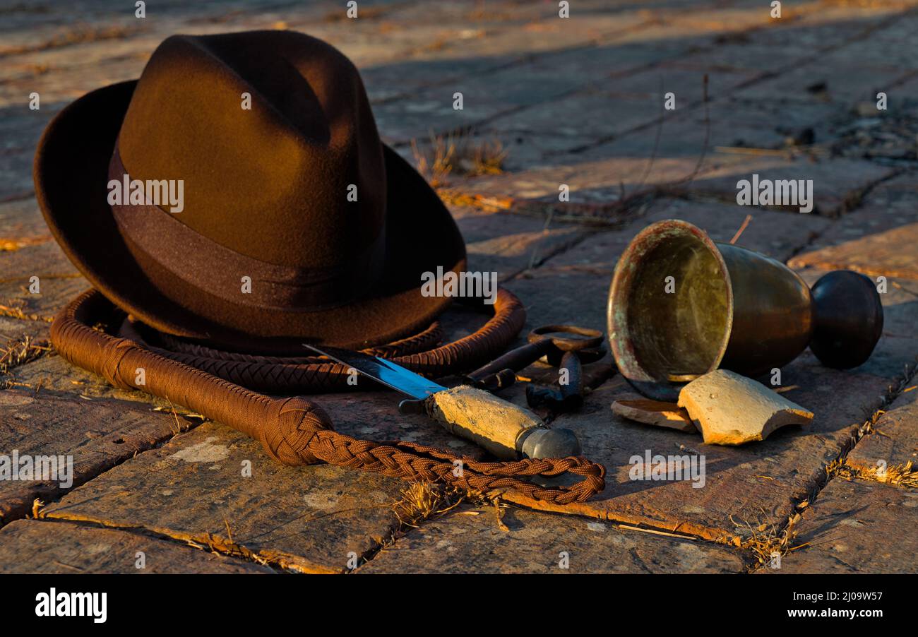 Adventurer themed scene with objects inspired on Indiana Jones Films Stock Photo