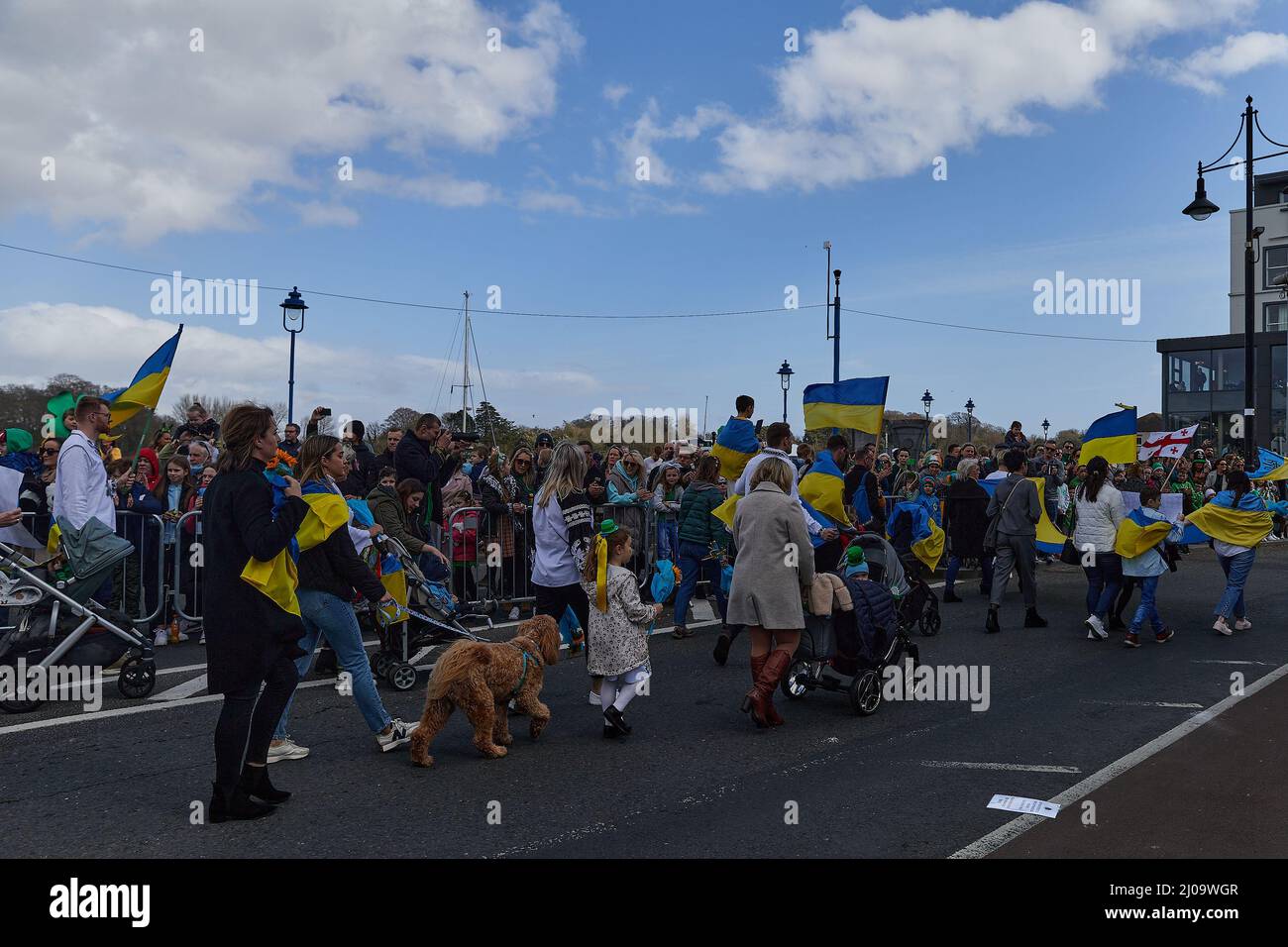 WATERFORD - IRELAND - MARCH 17-2022 Ukrainian community at the St. Patrick's Day parade protesting and rejecting the war against Russia. Stock Photo