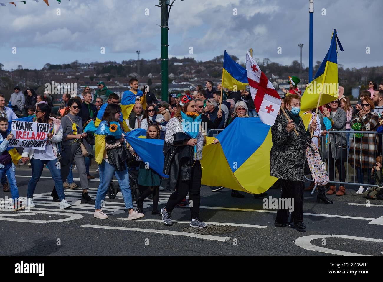 WATERFORD - IRELAND - MARCH 17-2022 Ukrainian community at the St. Patrick's Day parade protesting and rejecting the war against Russia. Stock Photo