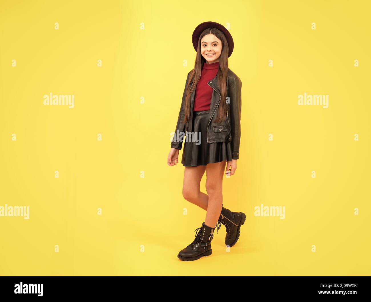 happy teen girl in hat and leather clothes, fashion Stock Photo