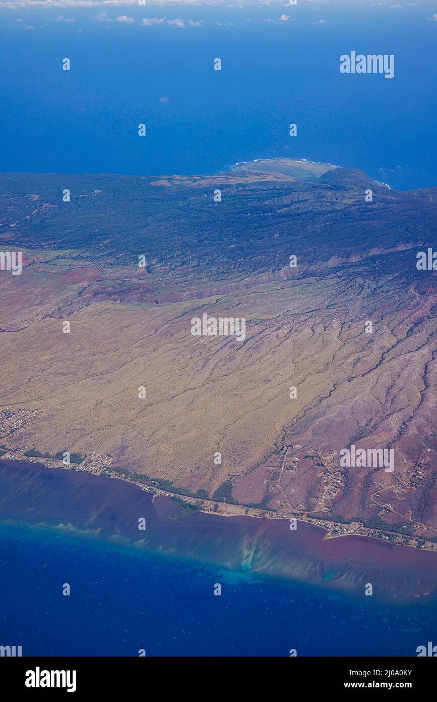 An aerial view with two fish ponds on the south shore of the island of Molokai across to the Kalaupapa Peninsula on the north side, home of Kalaupapa Stock Photo