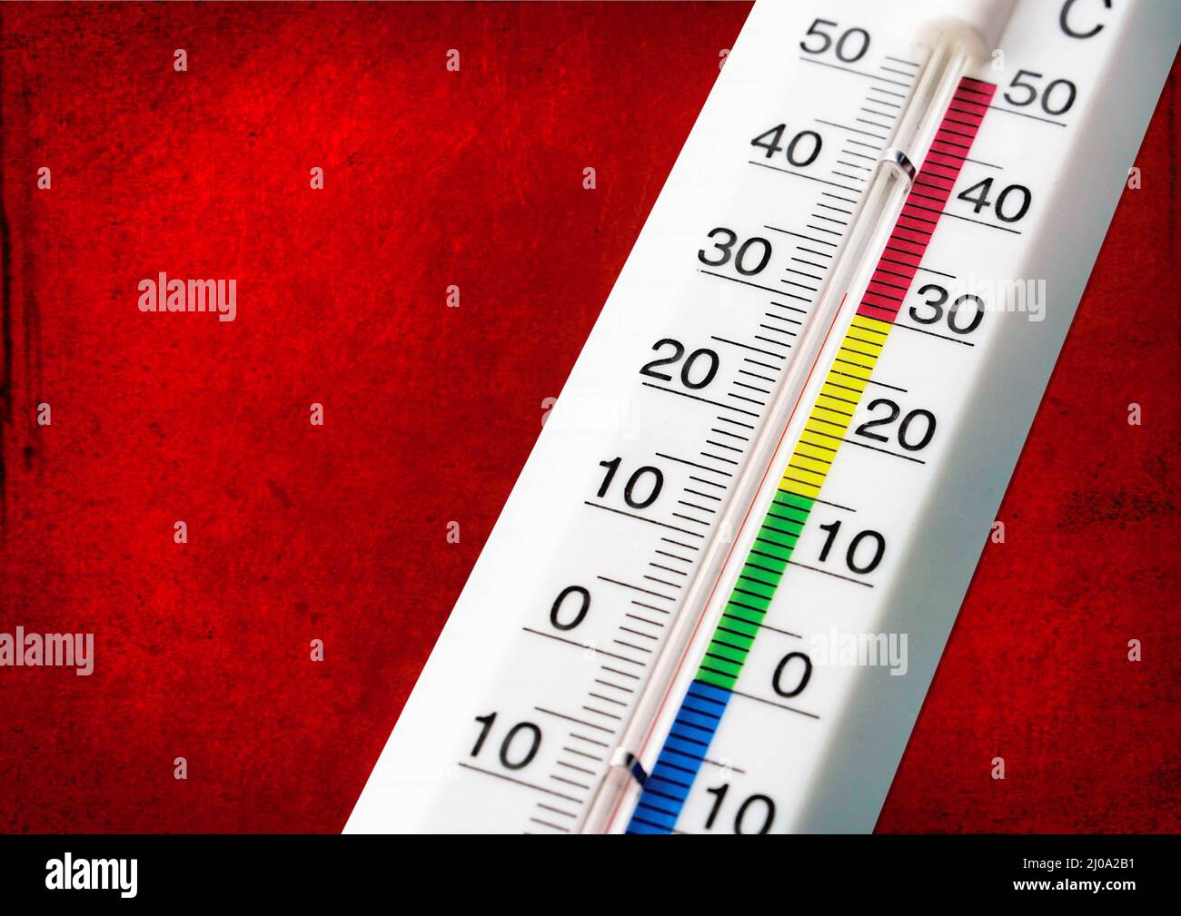 white temperature gauge on red background Stock Photo