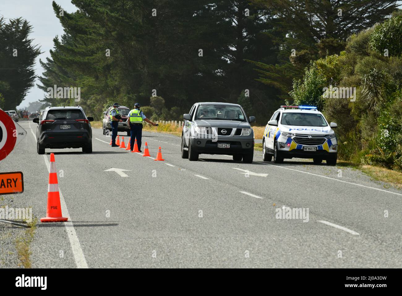 KUMARA, NEW ZEALAND, JANUARY 8, 2022: Police stop vehicles and test for drink drivers at a breathalyser checkpoint on the day of the Kumara race meeting Stock Photo