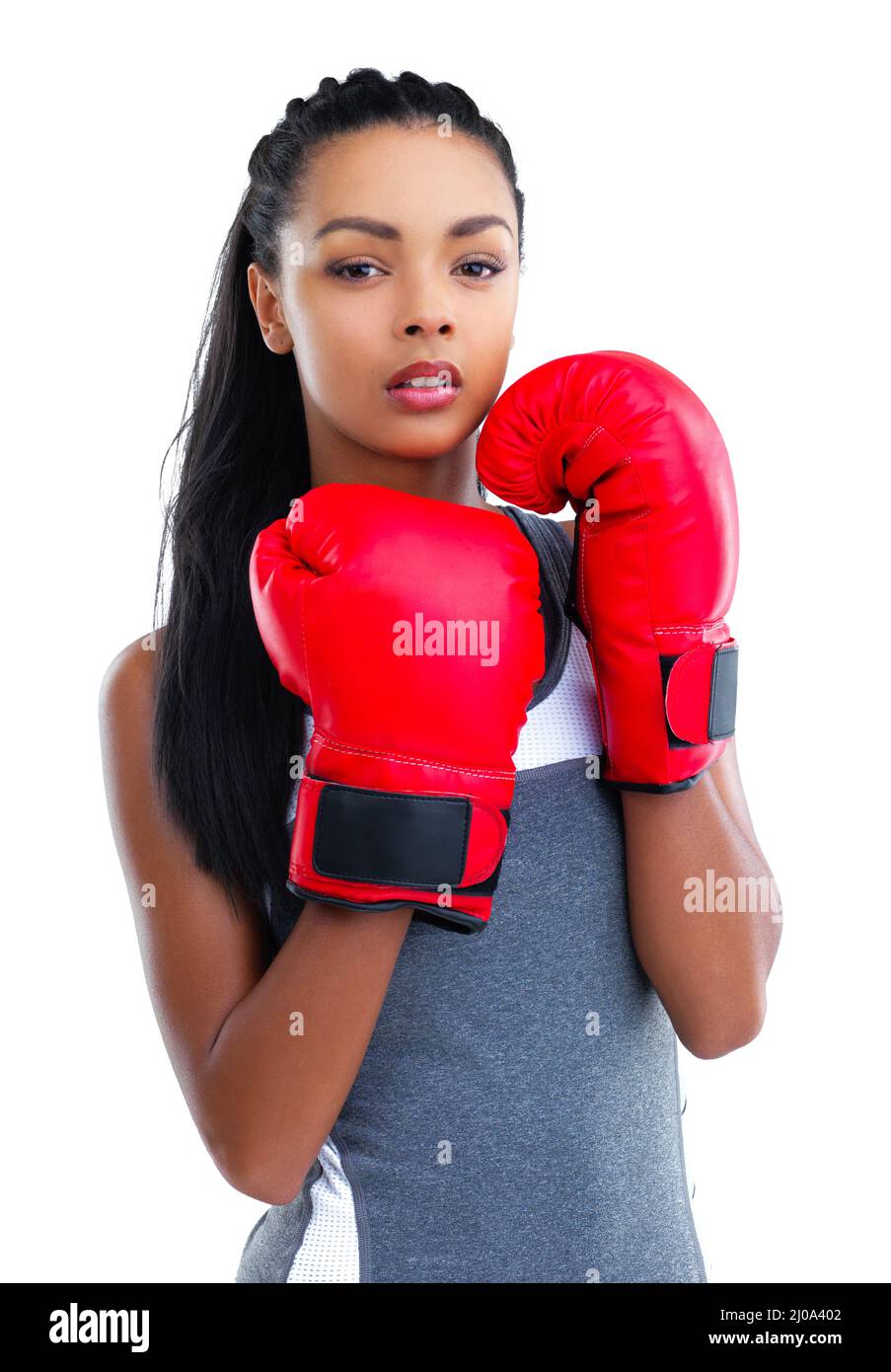 Im ready for a fight. Cropped portrait of a female boxer isolated on