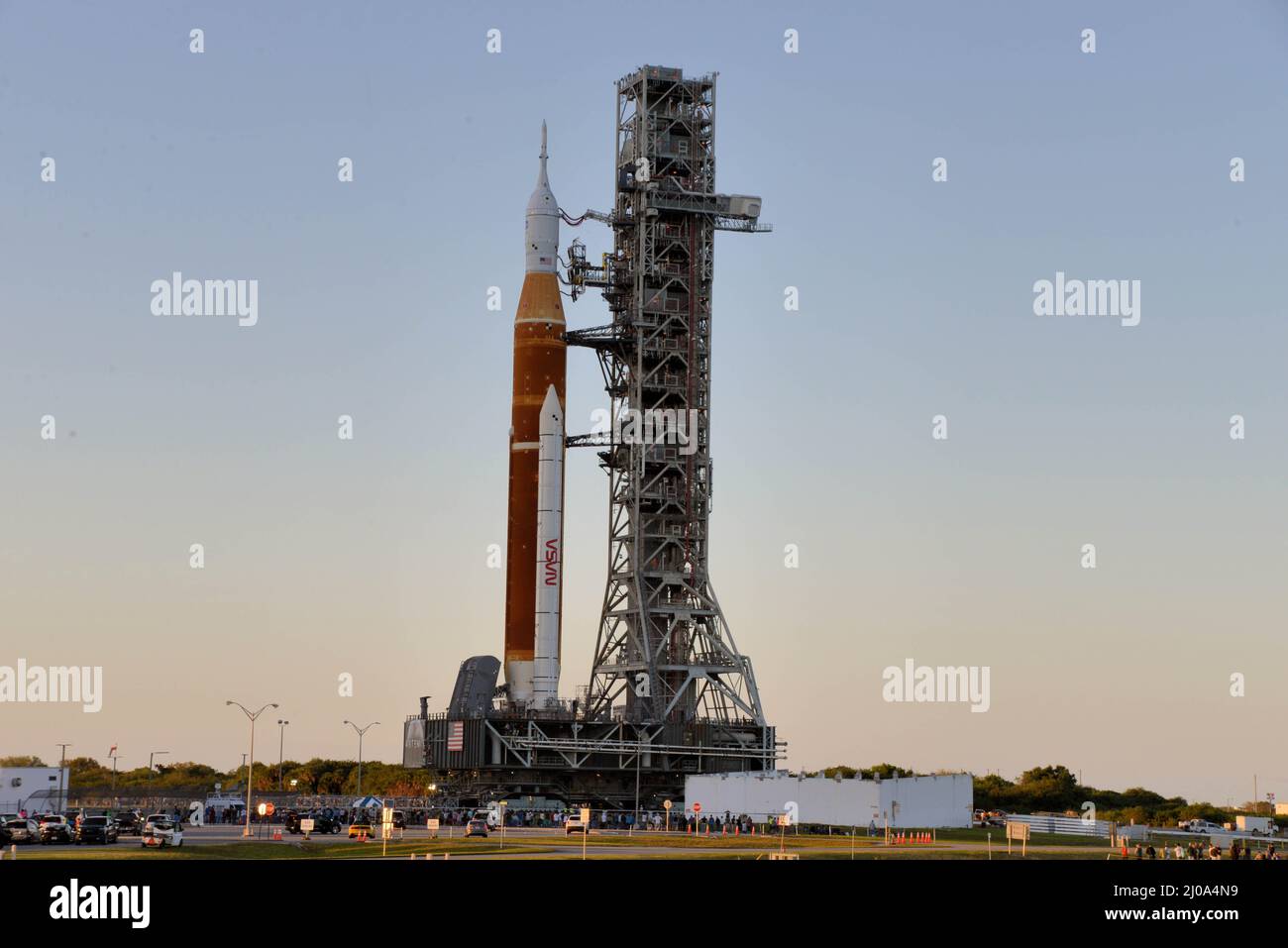 Kennedy Space Center. Brevard County. Florida. USA. March 17, 2022. NASA's Space Launch System (SLS) rocket with the Orion spacecraft aboard leaves atop a mobile launcher from High Bay 3 at the Vehicle Assembly Building heading to Launch Complex 39-B. The fully stacked and integrated SLS rocket and Orion spacecraft will undergo a wet dress rehearsal at Launch Complex 39B to verify systems and practice countdown procedures for the first launch. Photo Credit: Julian Leek/Alamy Live News Stock Photo