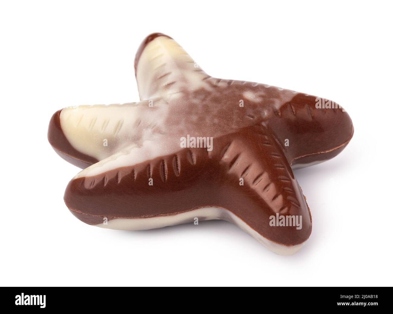 Chocolate sweets shaped as seashells isolated on white background Stock Photo